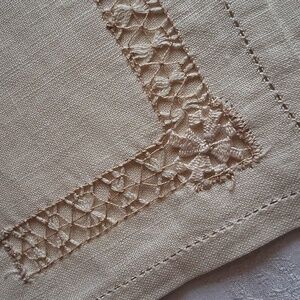 Set of twelve (12) elegant cream-colored lace-trimmed linen dinner napkins